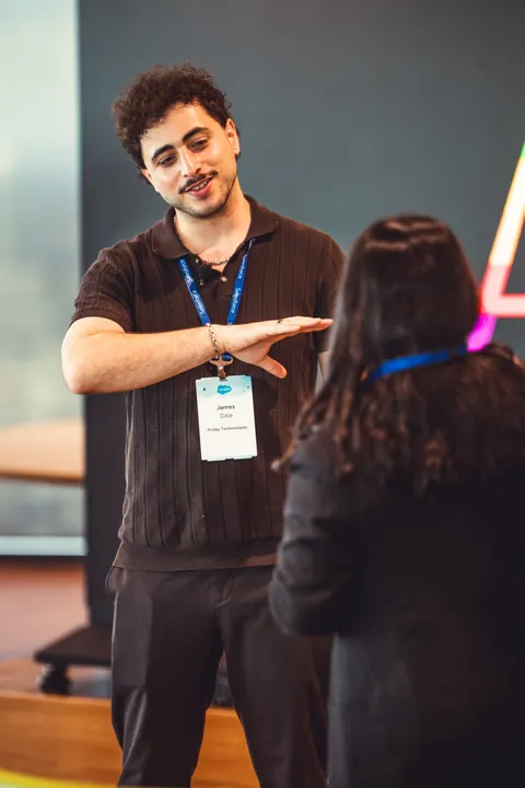 Speaker explaining a point during a talk