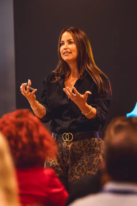 Speaker presenting to the audience